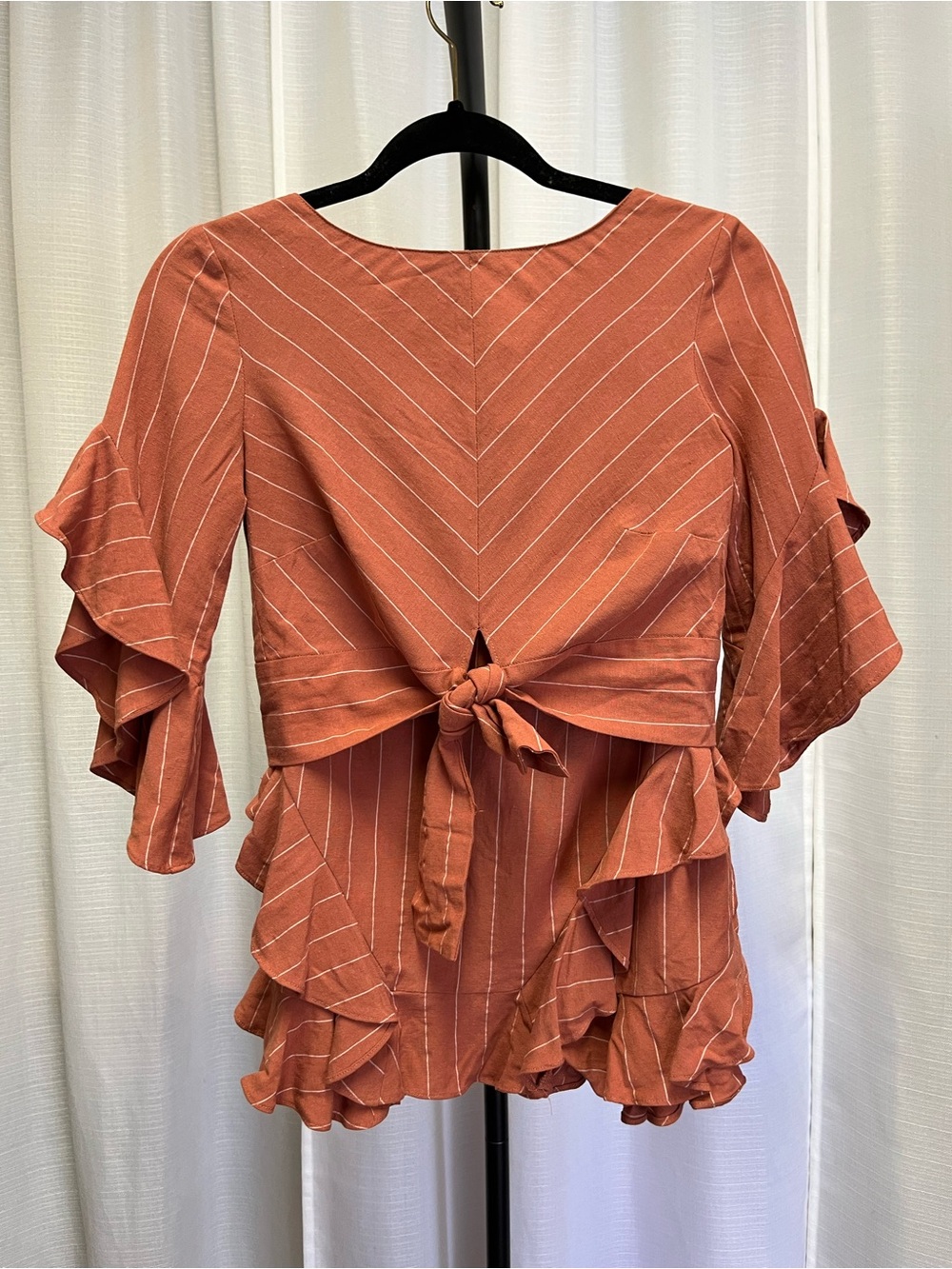 Saylor two-piece crop top and ruffle skirt set  in orange | size XS